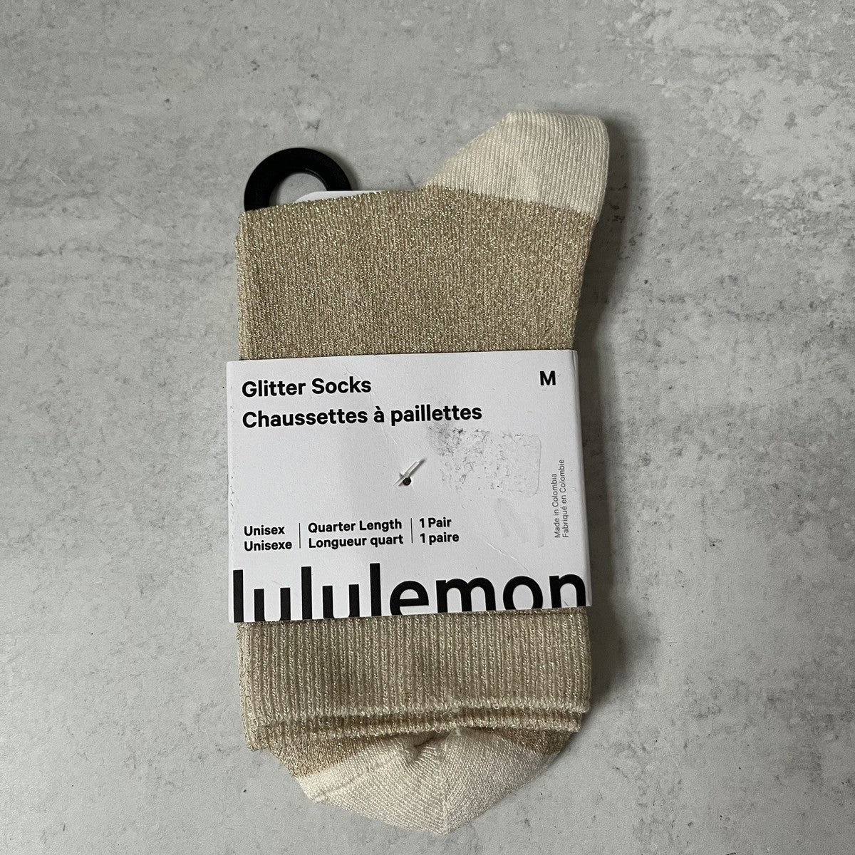 Calcetas Lululemon doradas con glitter talla M